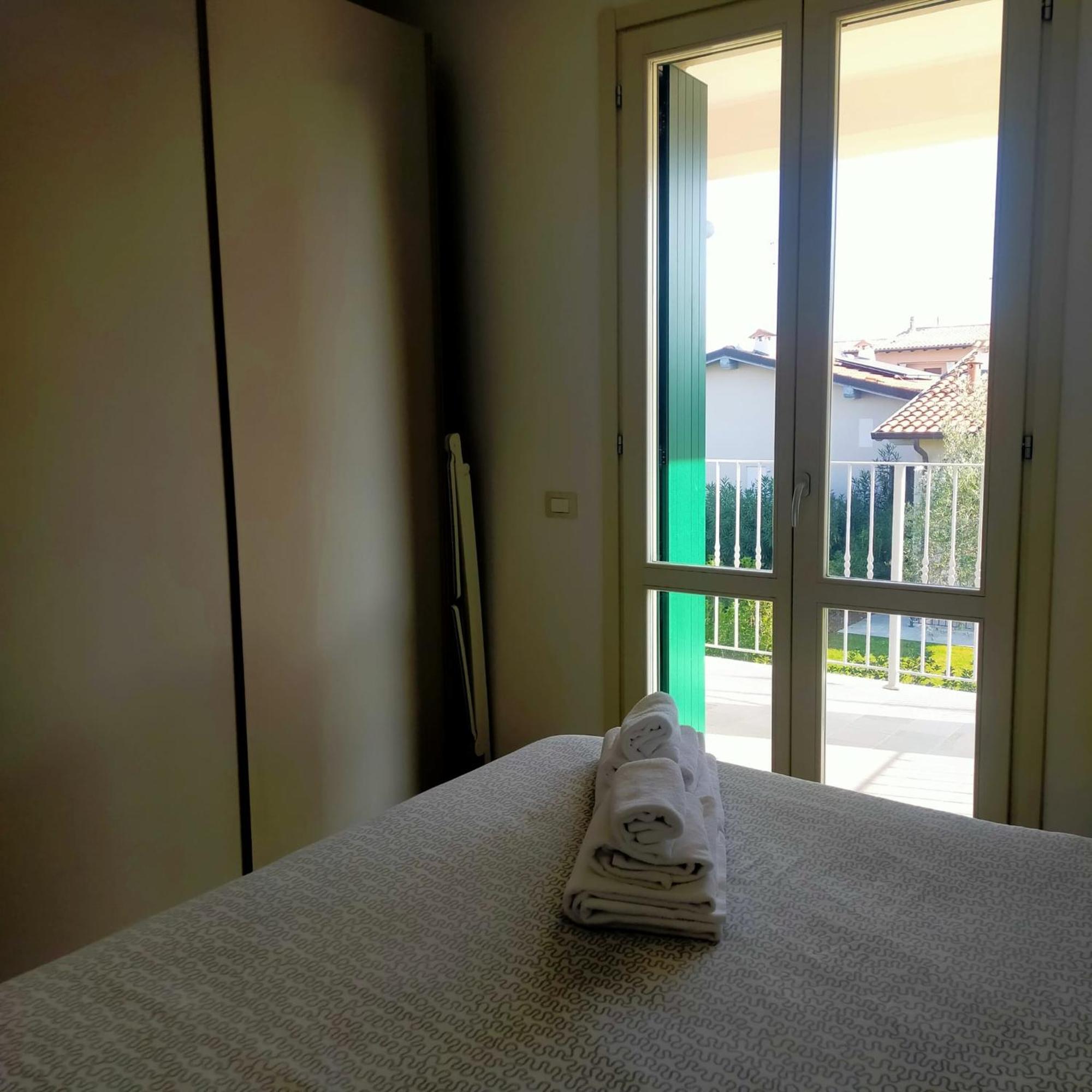 Residence Fiore Rosso Sirmione Quarto foto